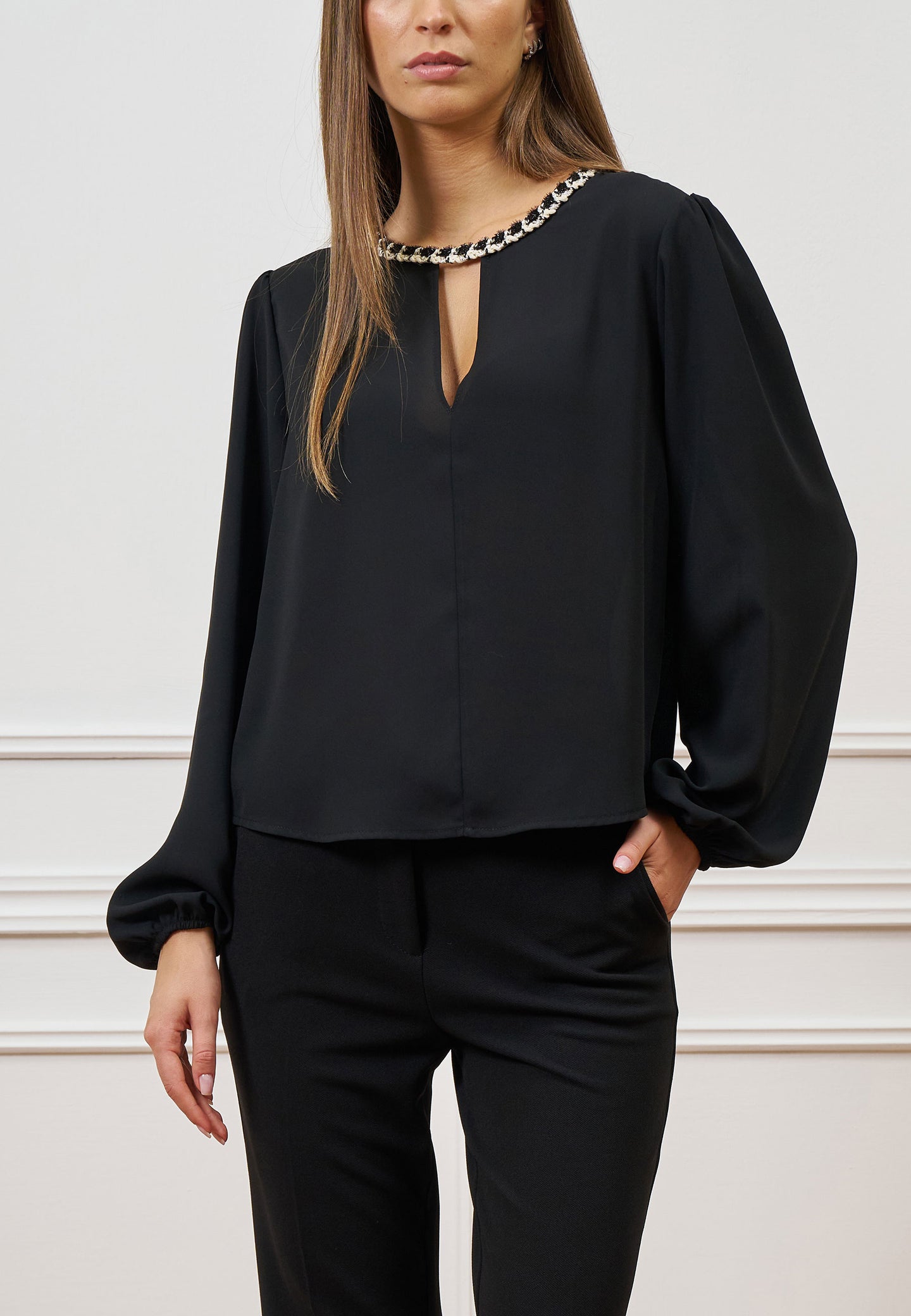 Blusa con scollo a goccia