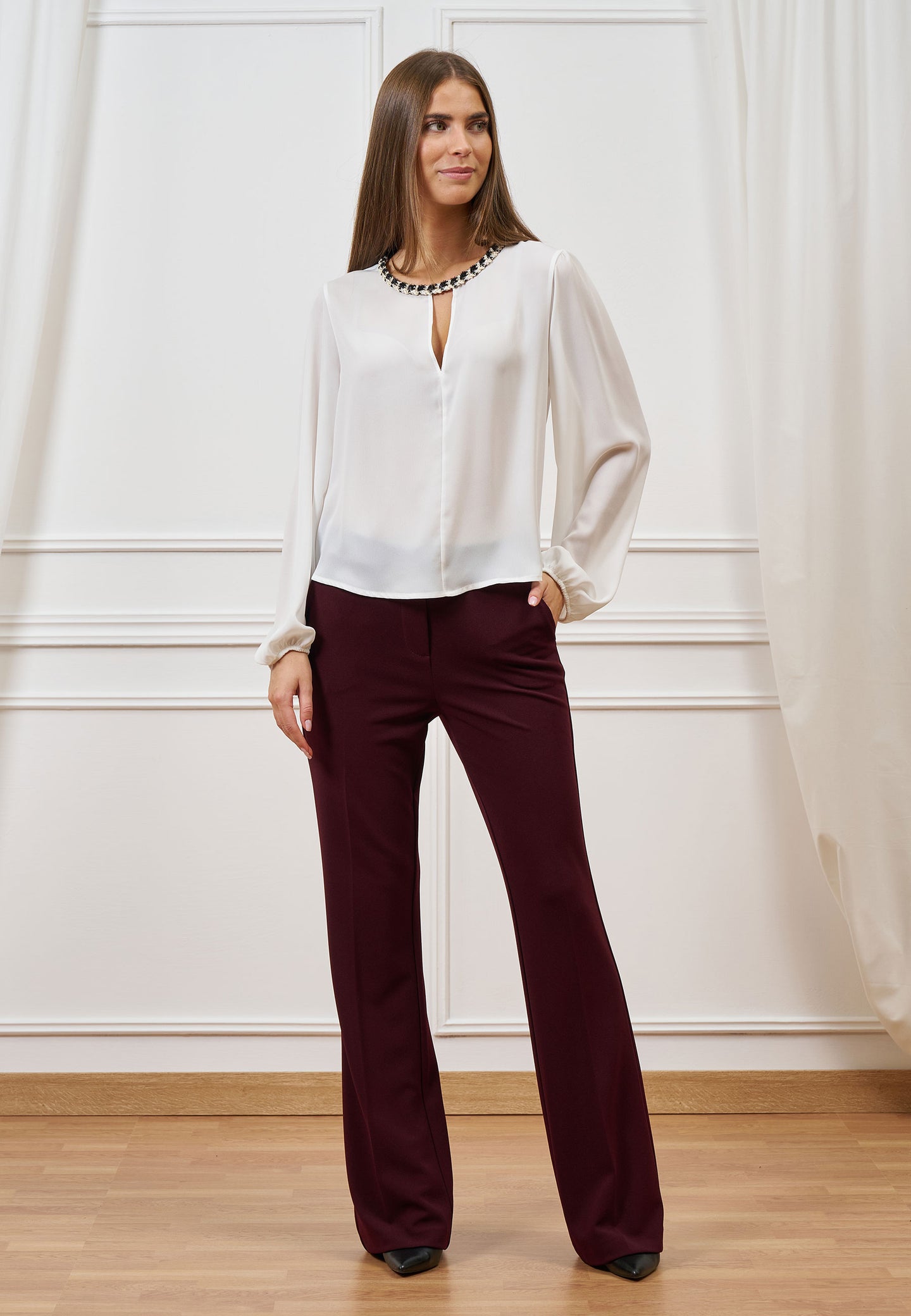 Blusa con scollo a goccia