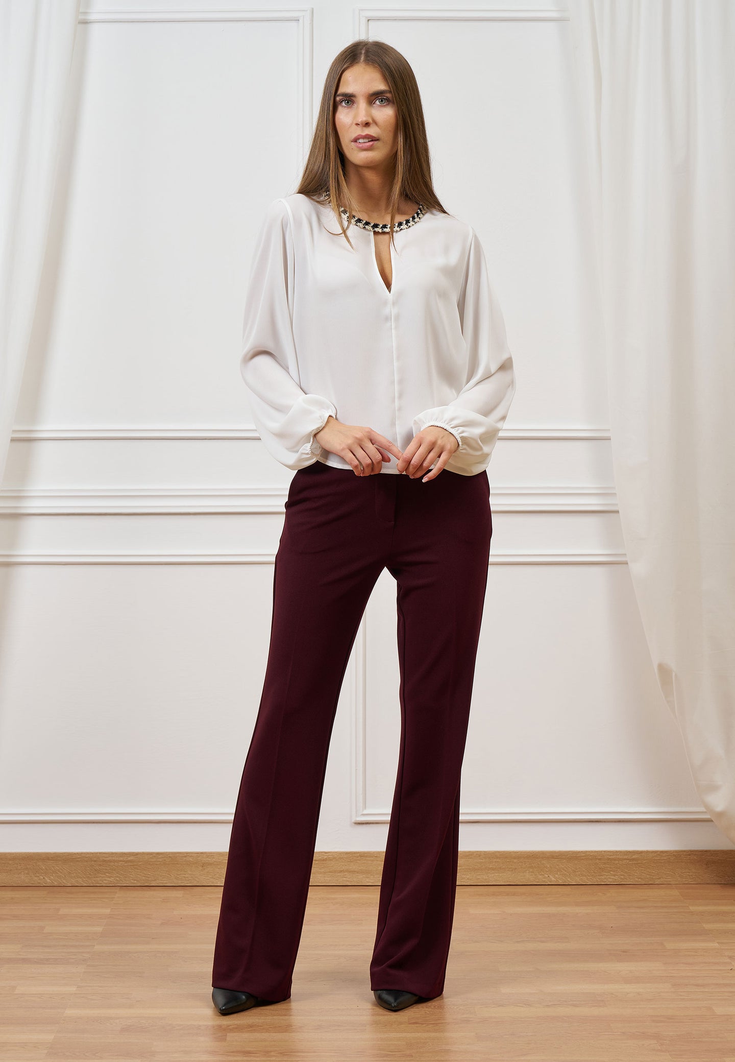 Blusa con scollo a goccia