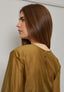 Blusa in mussola con fusciacca