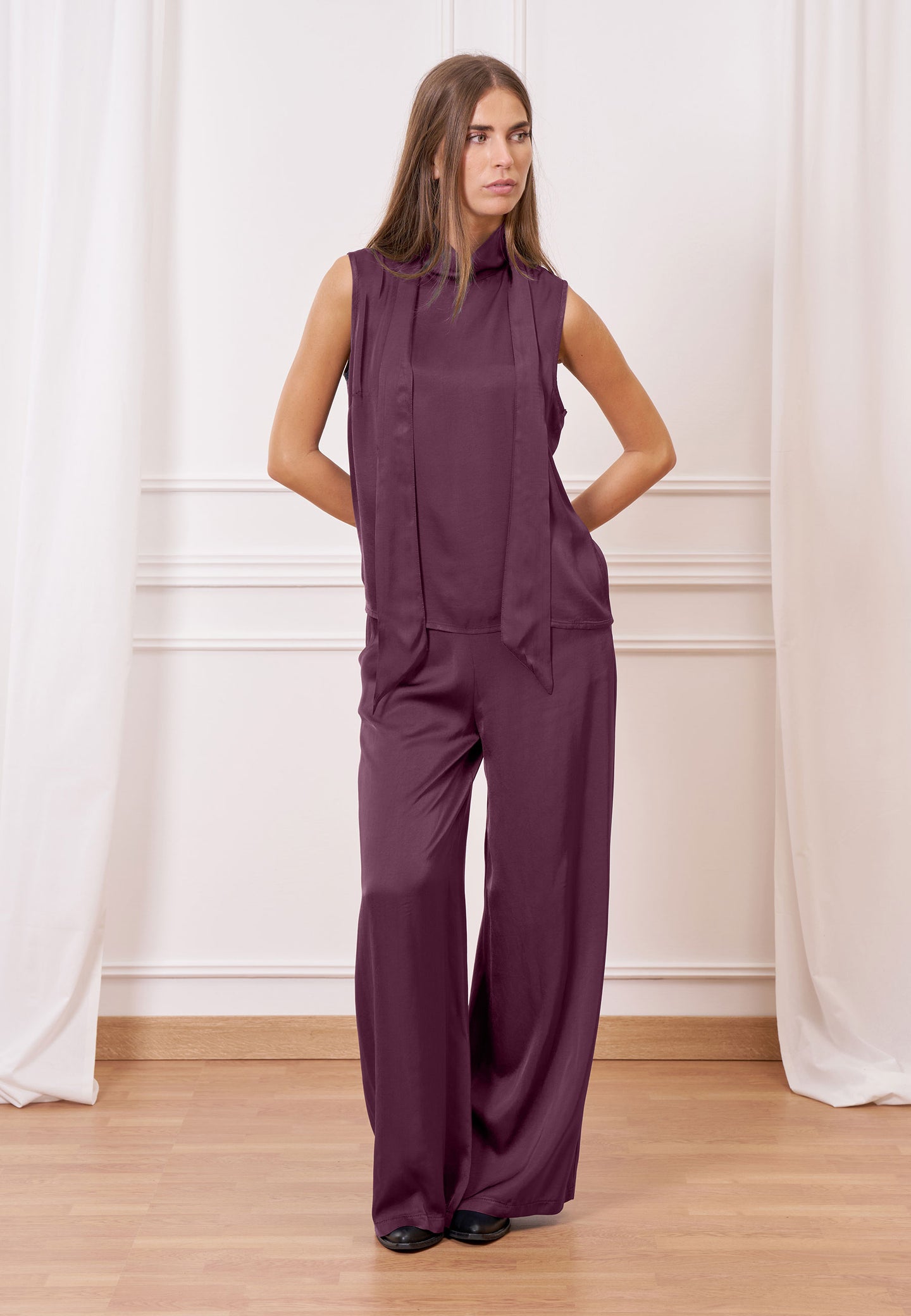 Blusa in raso con laccio