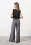 Blusa in raso stretch smanicata
