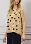 Blusa over a pois con fiocco