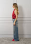 Blusa raso smanicata collo alto