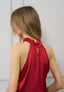 Blusa raso smanicata collo alto