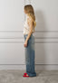 Blusa raso smanicata collo alto