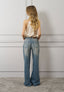 Blusa raso smanicata collo alto