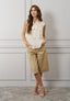 Blusa smanicata con volant