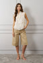 Blusa smanicata con volant