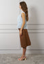 Blusa smanicata con volant