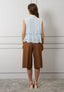 Blusa smanicata con volant