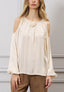 Blusa spalle scoperte con fiore