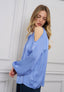 Blusa spalle scoperte con fiore
