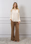 Blusa spalle scoperte con fiore