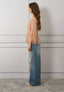 Blusa velata con top e rouches