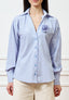 Camicia a righe con spilla - CELESTE