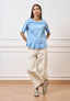 Camicia girocollo con pieghe sul fondo - CELESTE