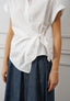 Camicia con nodo laterale