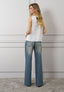 Camicia smanicata con volant