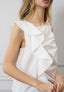 Camicia smanicata con volant
