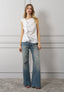 Camicia smanicata con volant