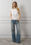 Camicia smanicata con volant