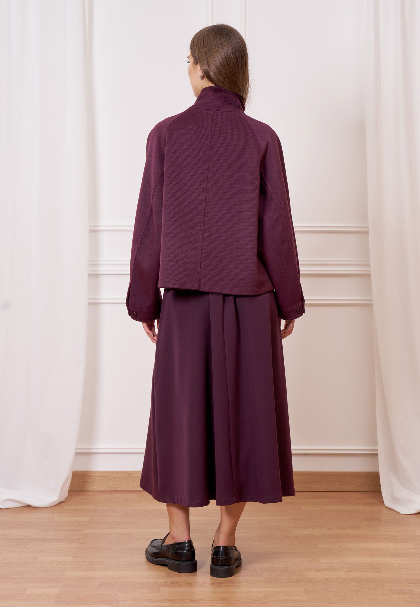 Cappotto corto tasche frontali