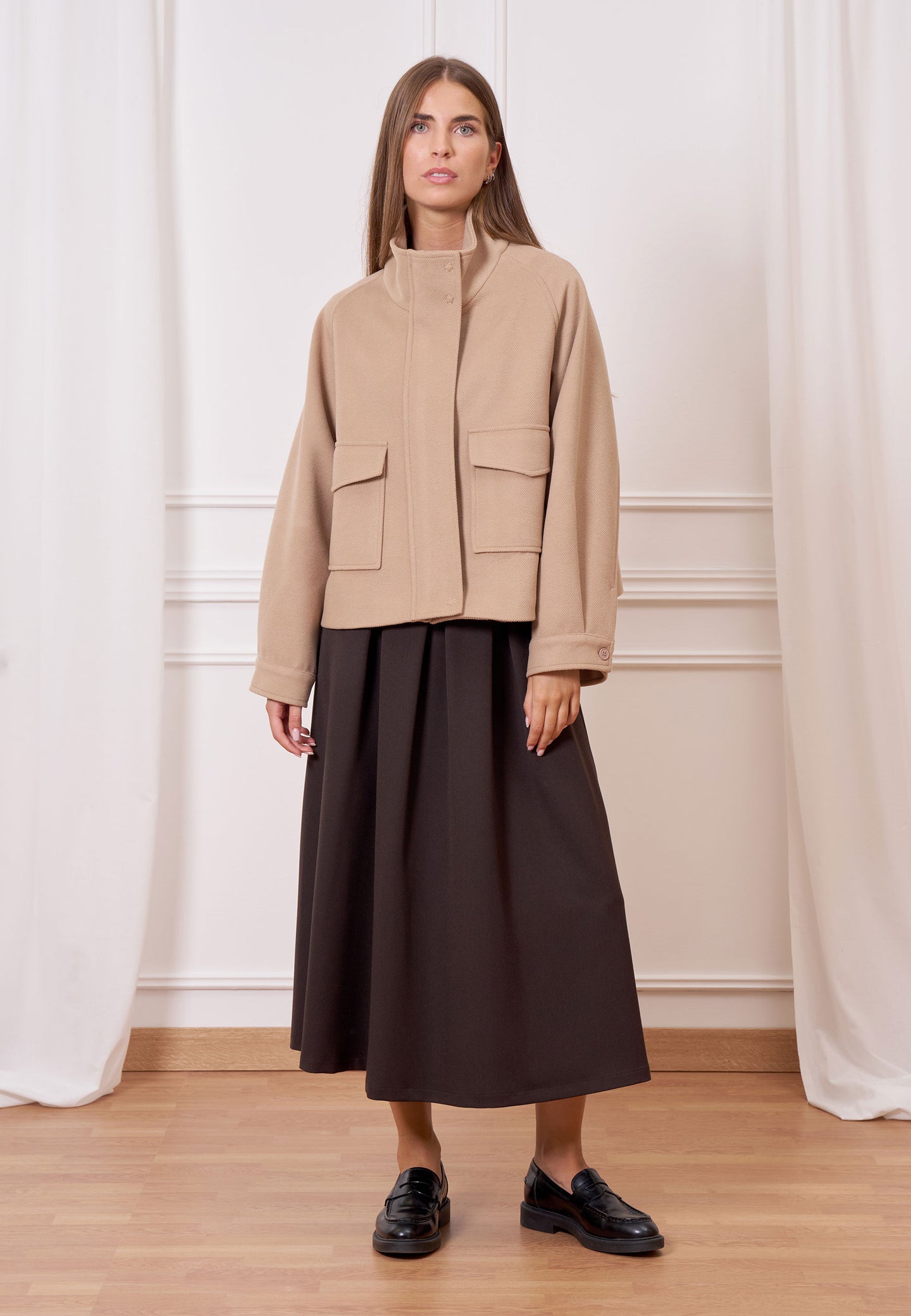 Cappotto corto tasche frontali