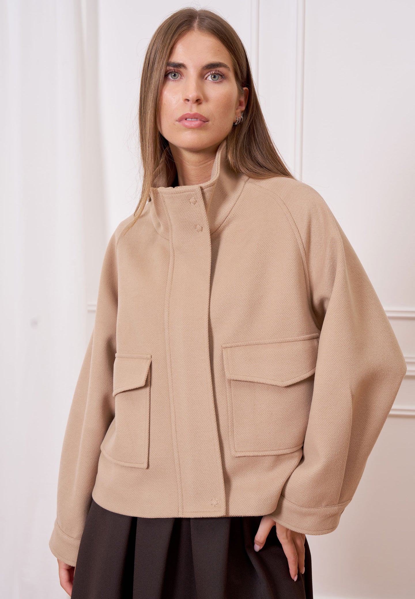 Cappotto corto tasche frontali