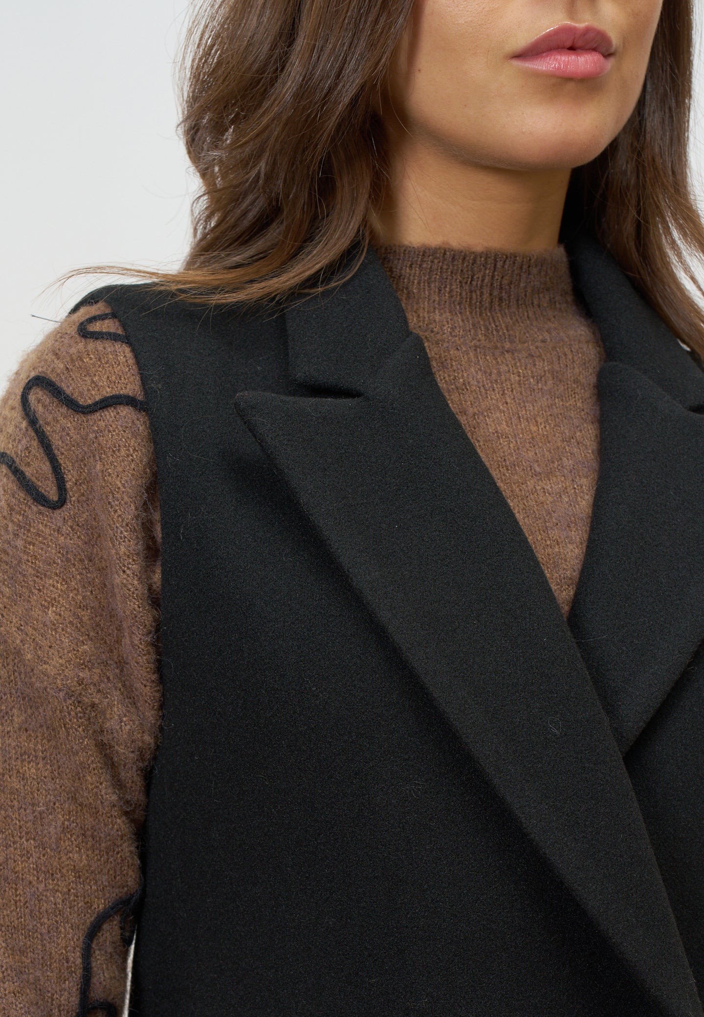 Cappotto lungo smanicato