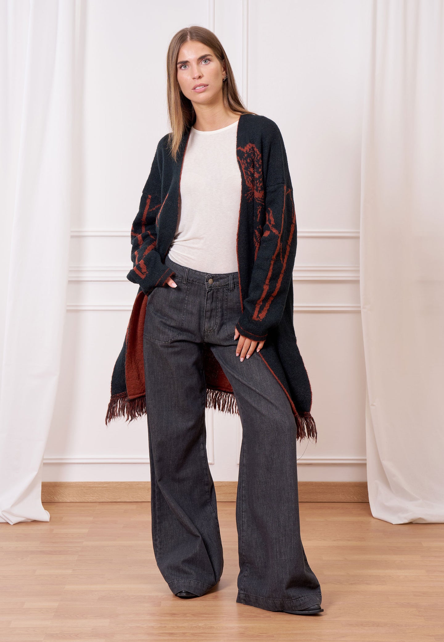 Cappotto maglia jacquard con frange