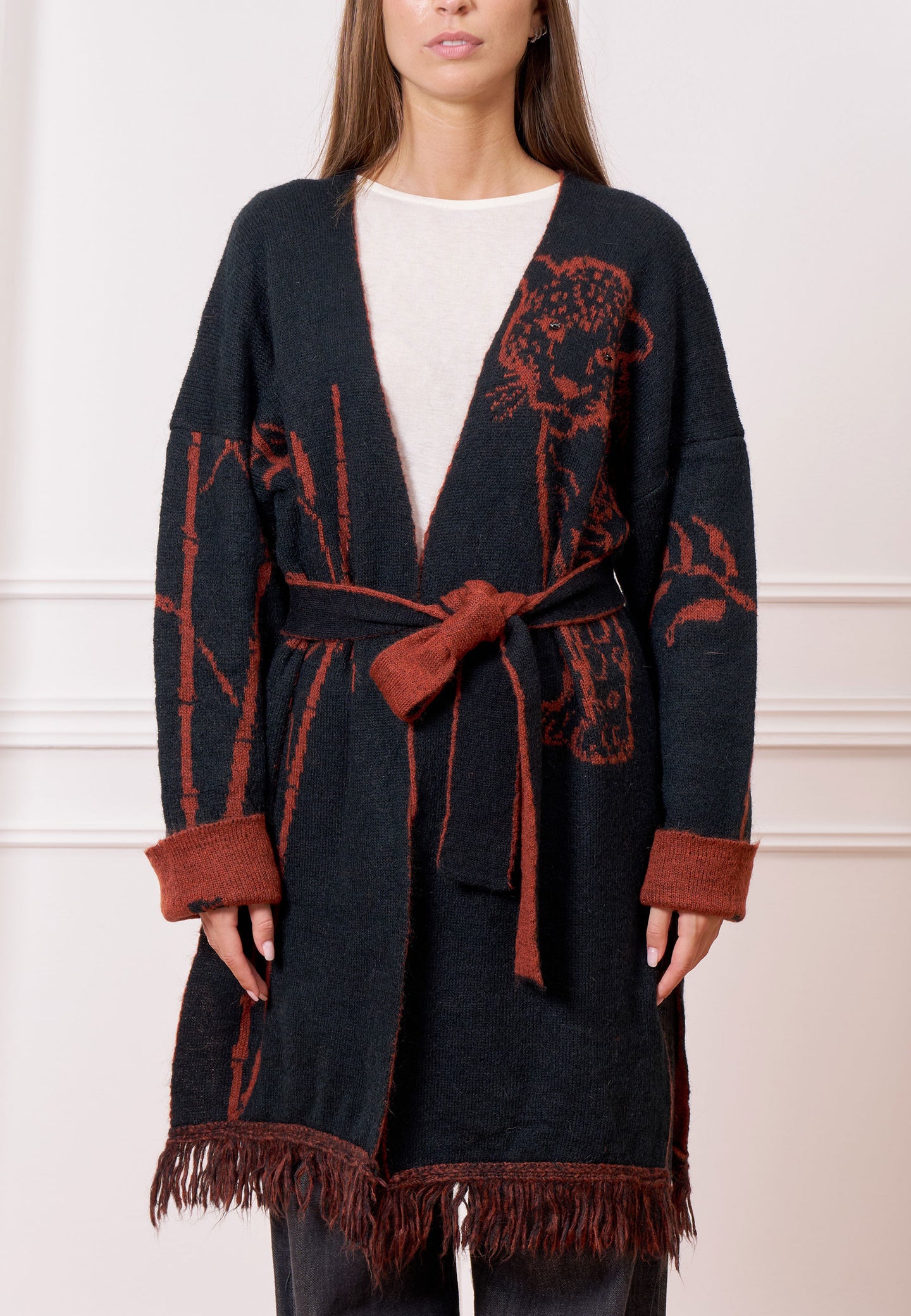 Cappotto maglia jacquard con frange