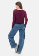 Cardigan paillettes scollo a v