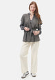 Cardigan smanicato bouclè con pailettes