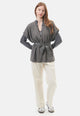 Cardigan smanicato bouclè con pailettes