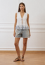 Blusa con laccetti e ricami sul fondo - BIANCO