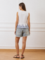 Blusa con laccetti e ricami sul fondo - BIANCO