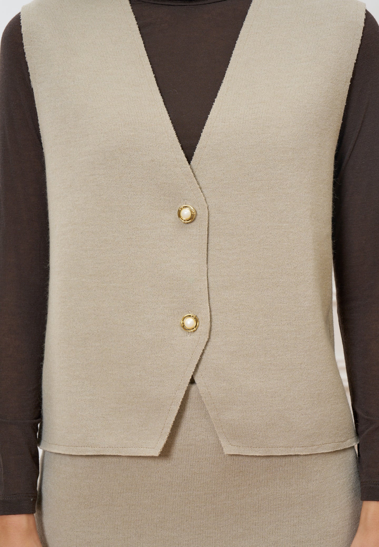 Gilet in maglia con bottoni gioiello