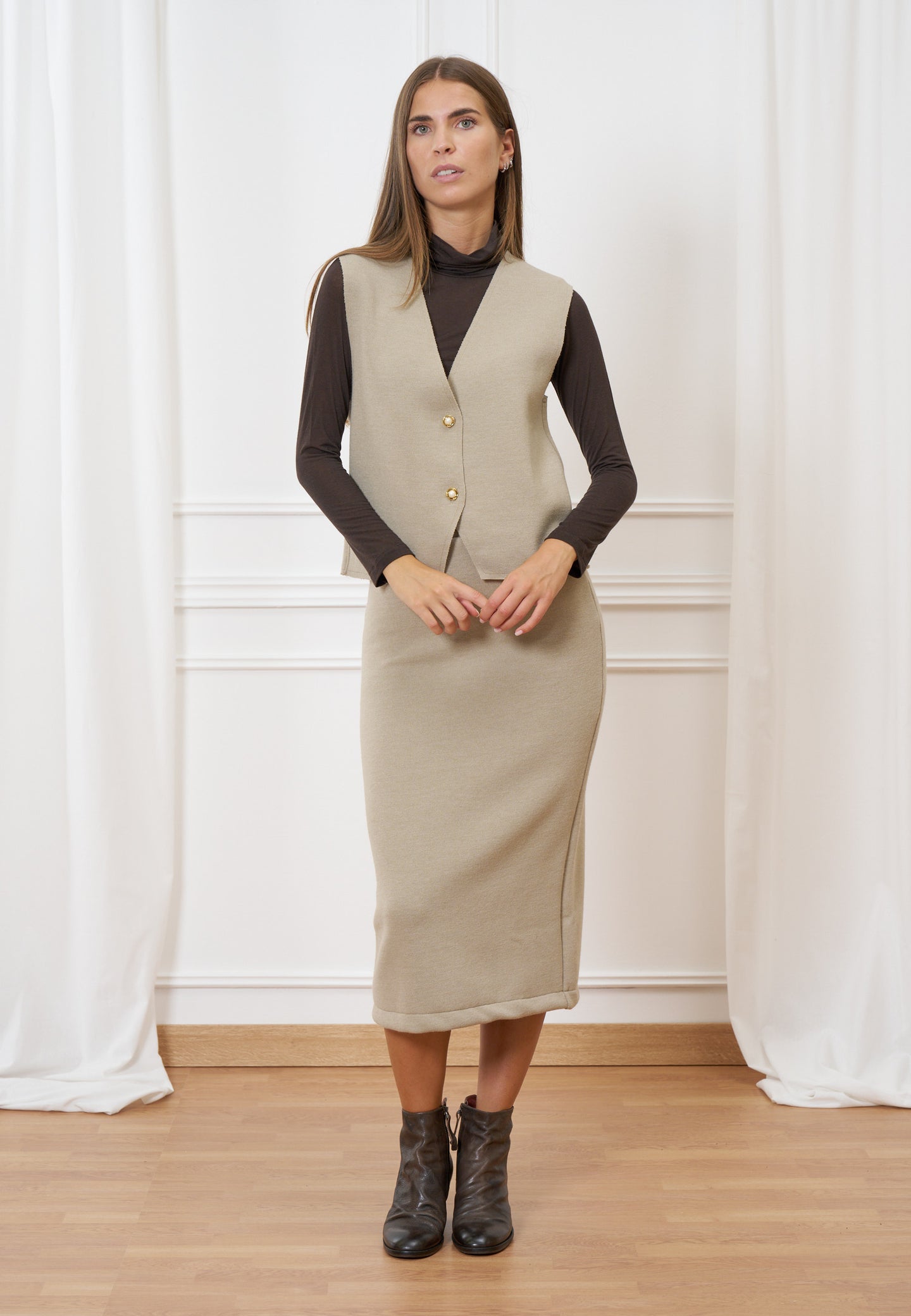 Gilet in maglia con bottoni gioiello