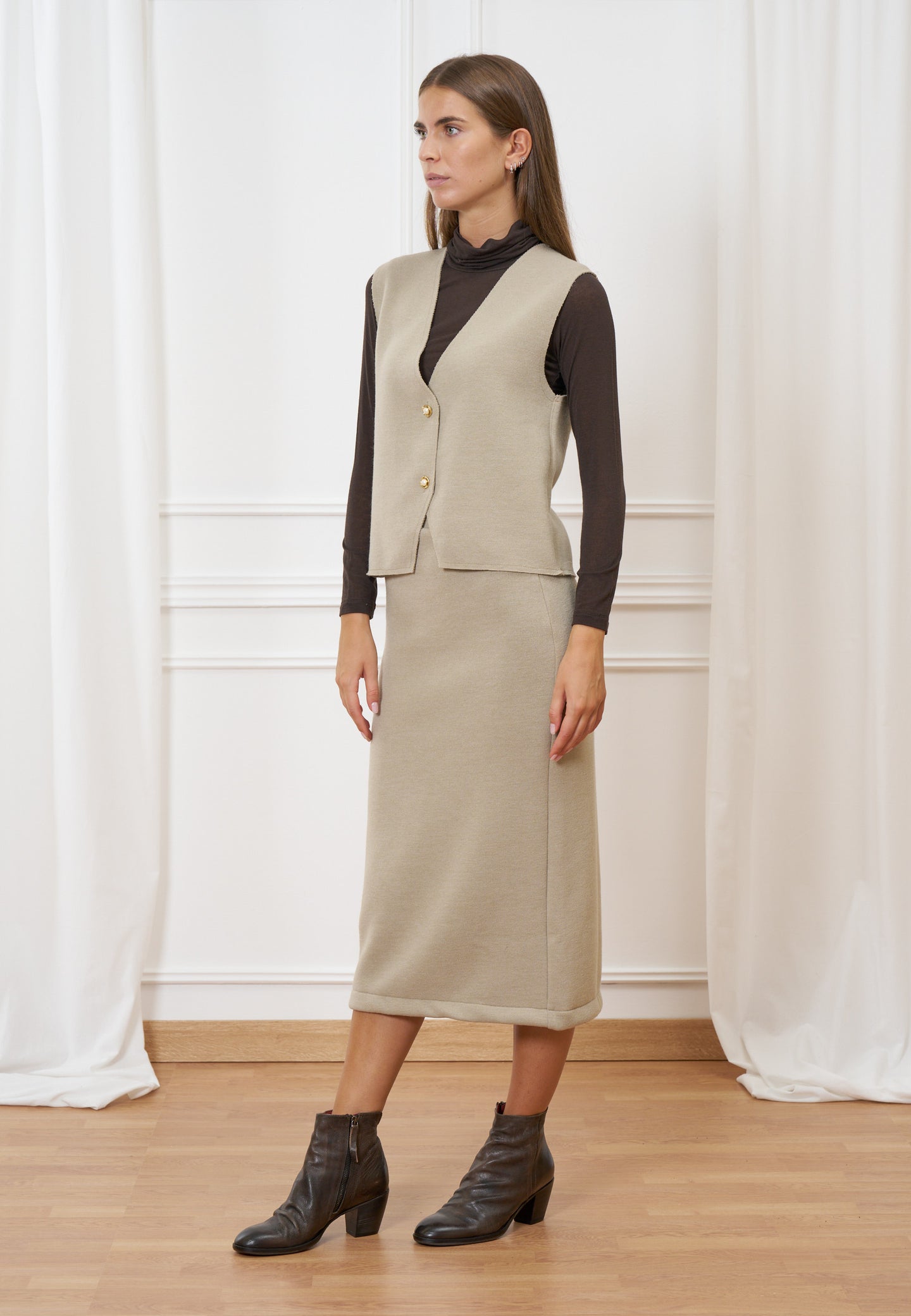 Gilet in maglia con bottoni gioiello