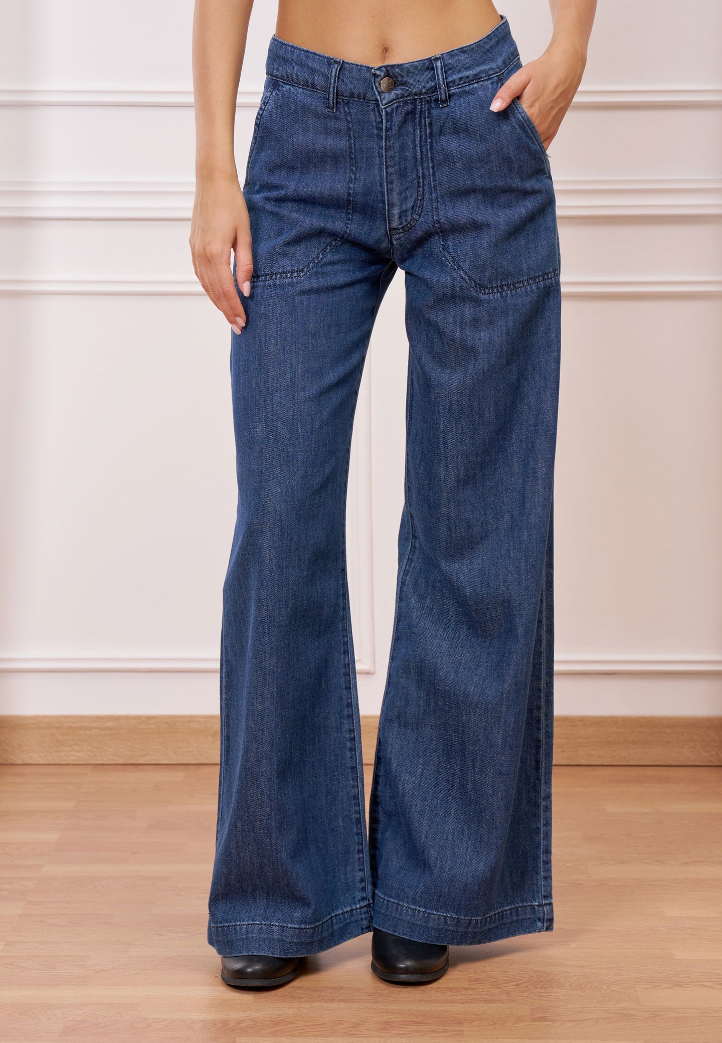 Jeans a gamba ampia cuciture tasche