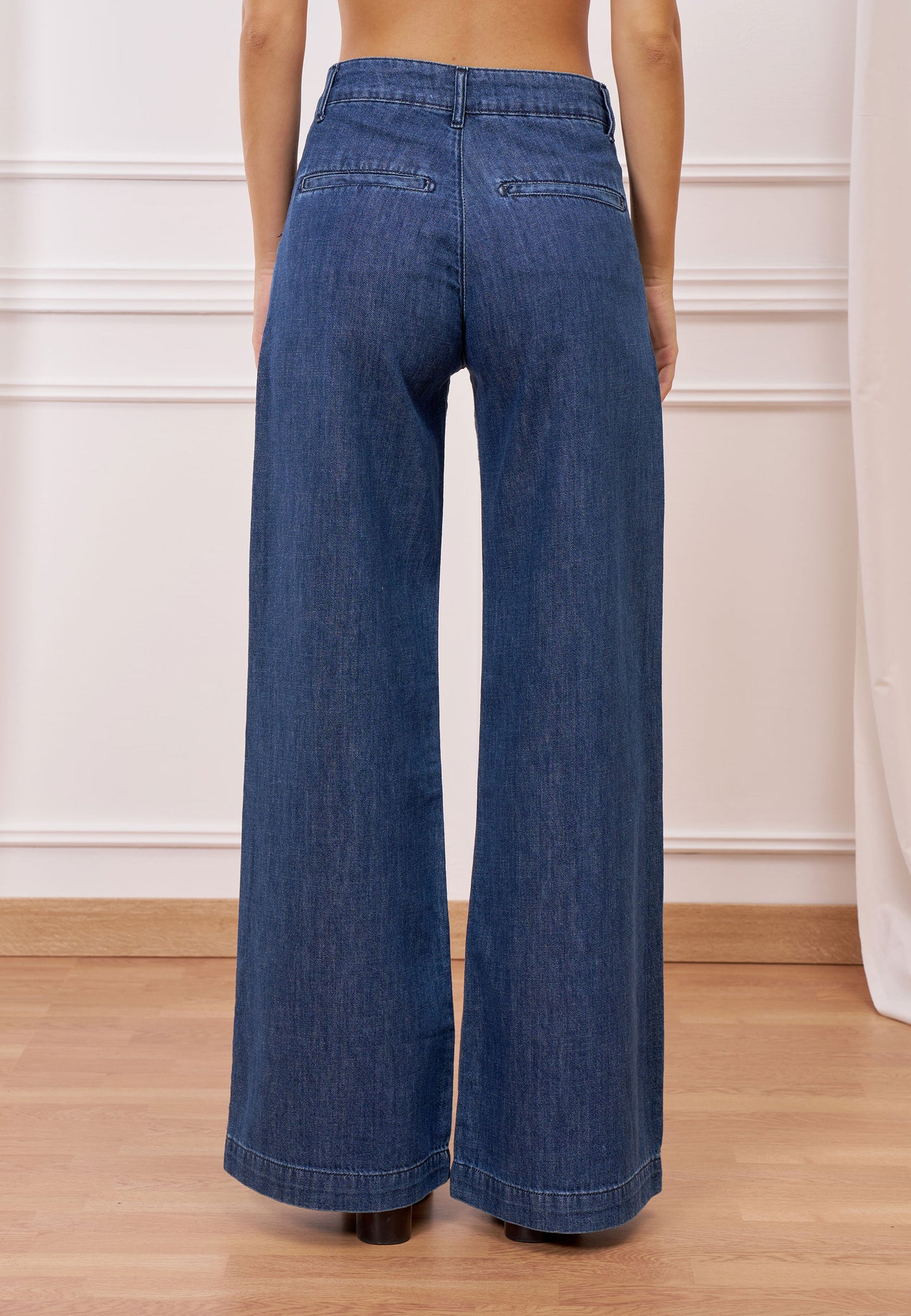 Jeans a gamba ampia cuciture tasche