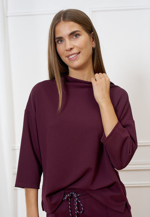 Maglia collo alto in scuba