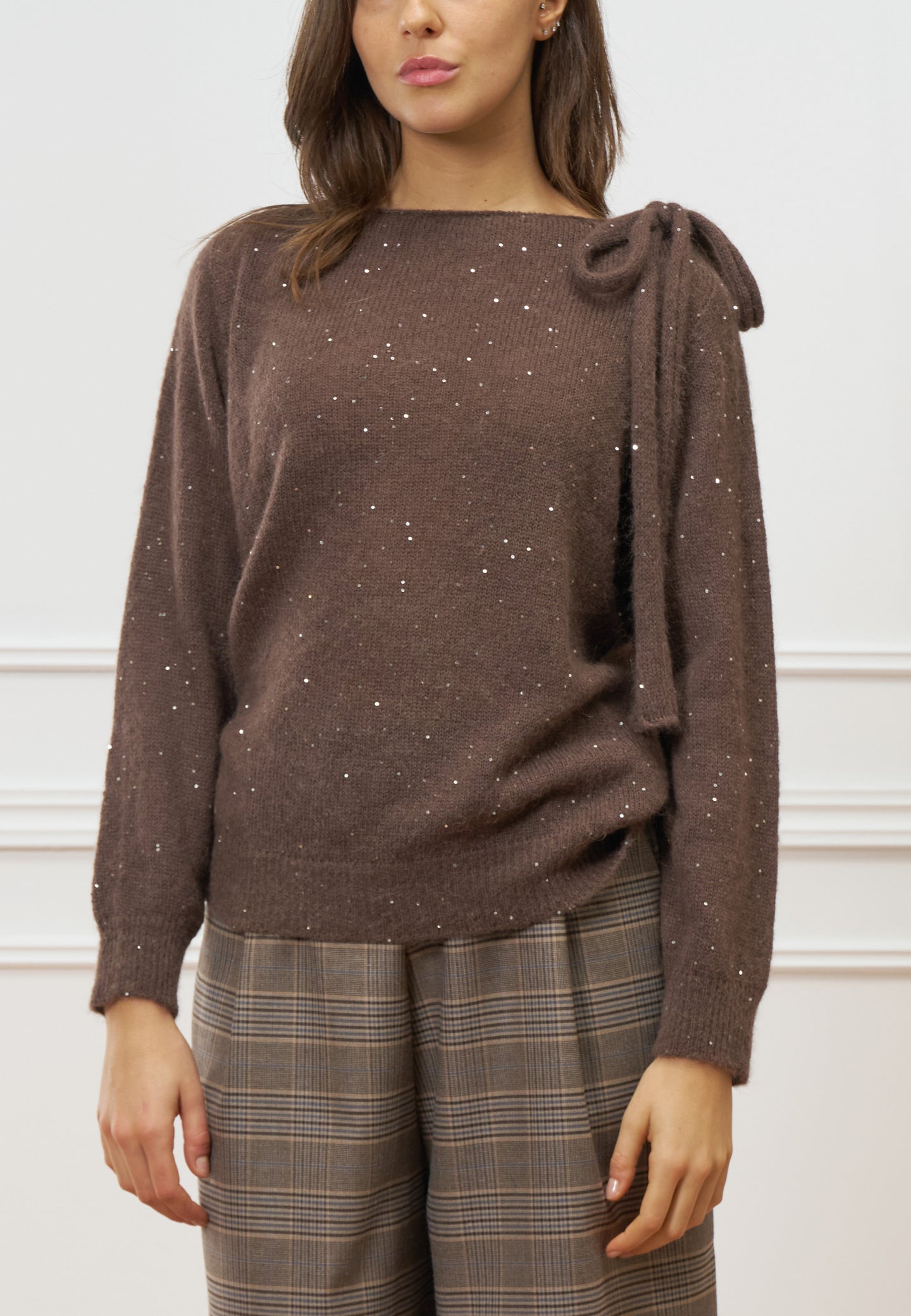 Maglia con fiocco e paillettes
