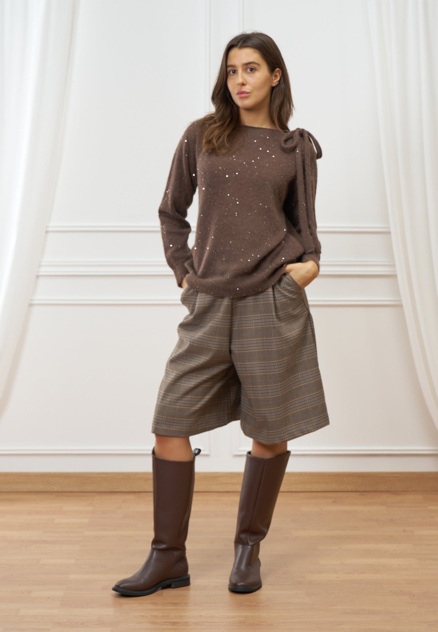 Maglia con fiocco e paillettes