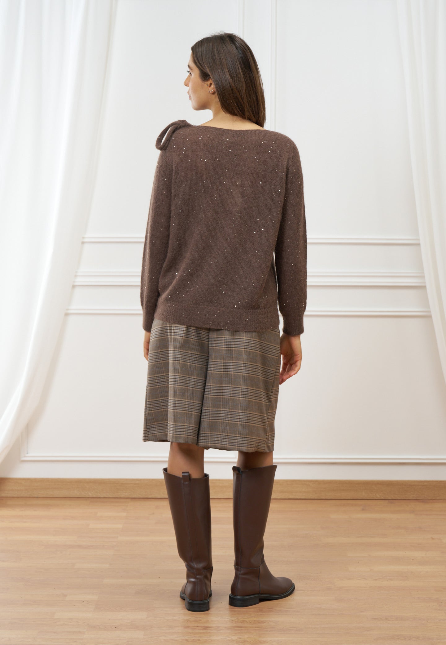 Maglia con fiocco e paillettes