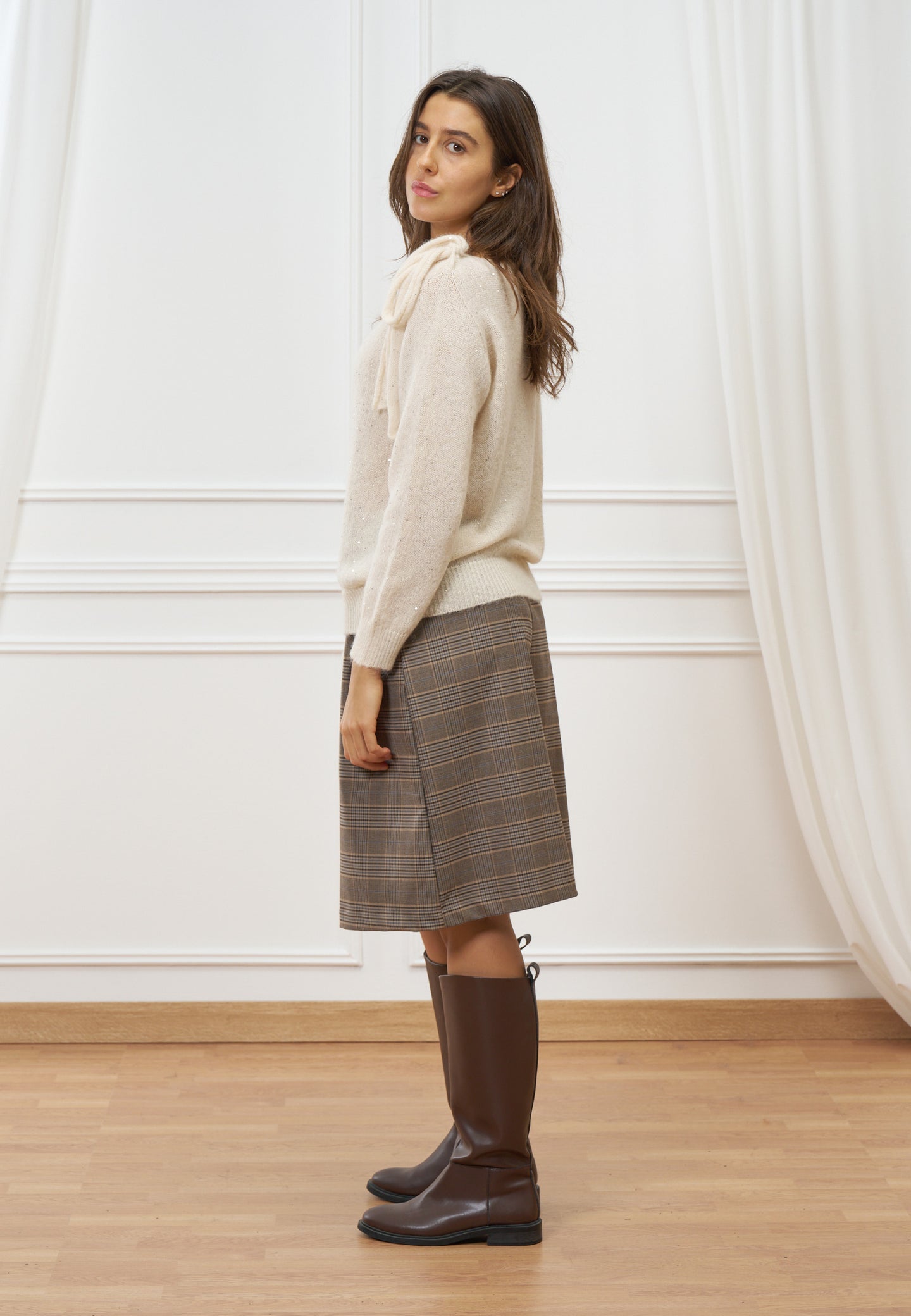 Maglia con fiocco e paillettes