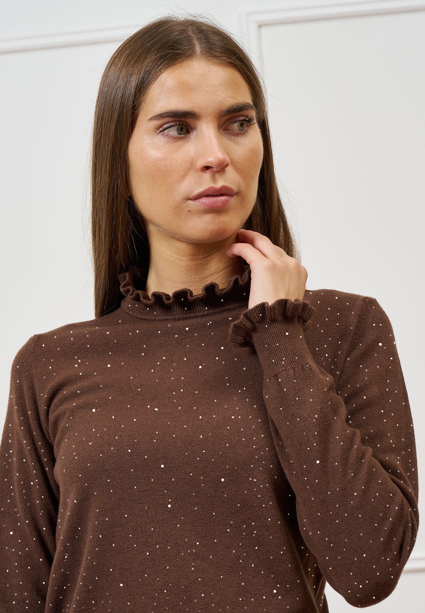 Maglia con rouches e paillettes
