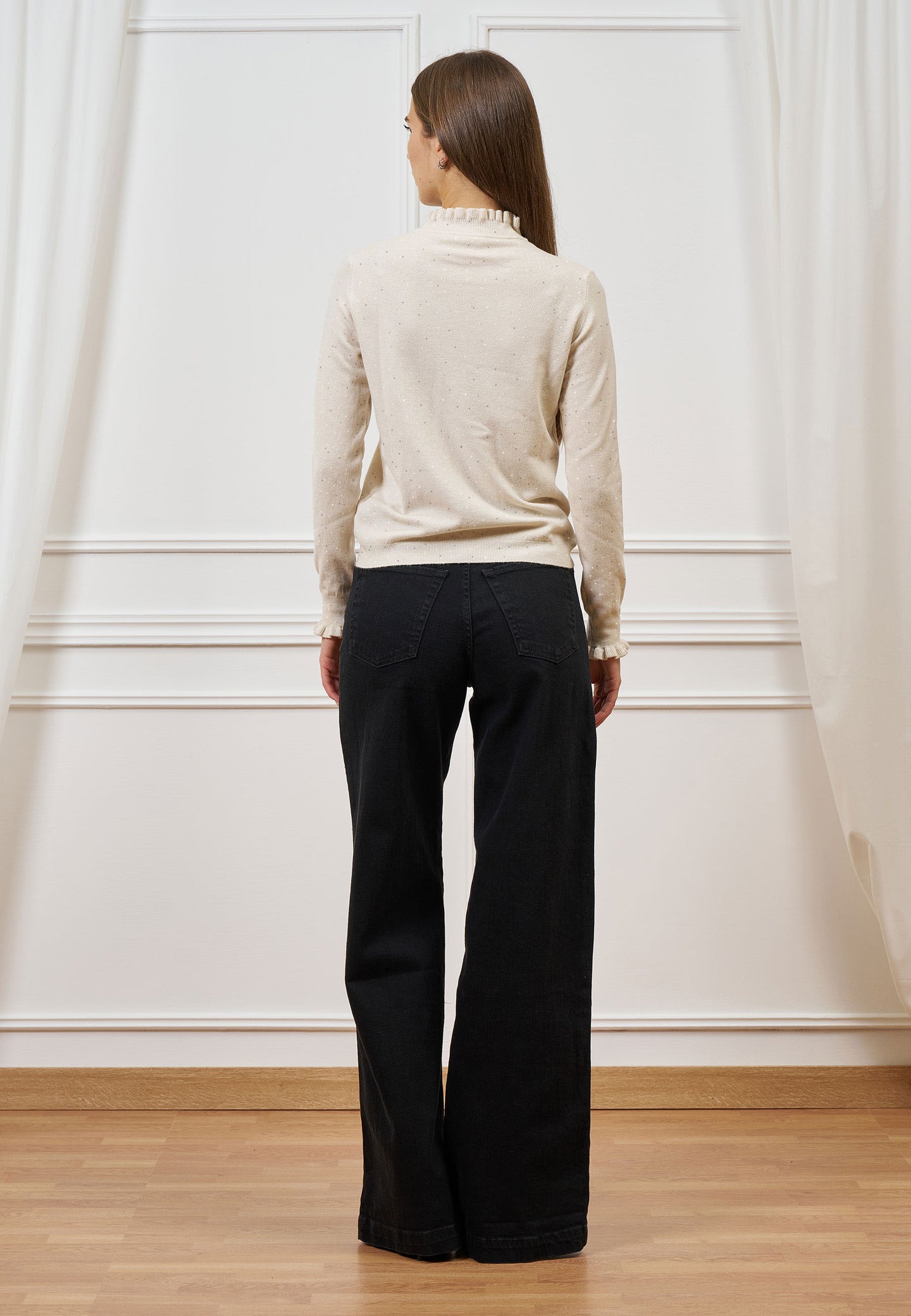 Maglia con rouches e paillettes