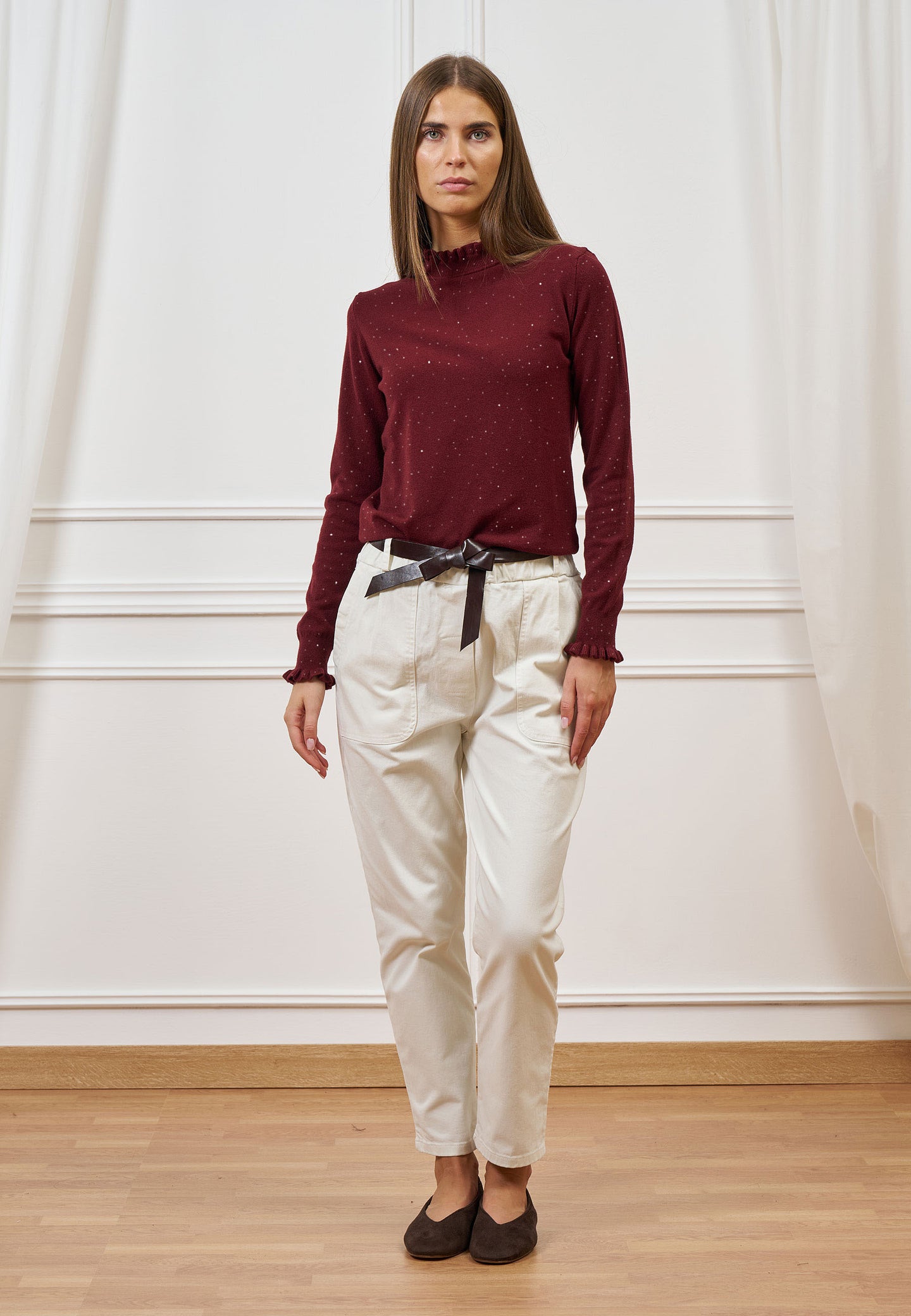 Maglia con rouches e paillettes